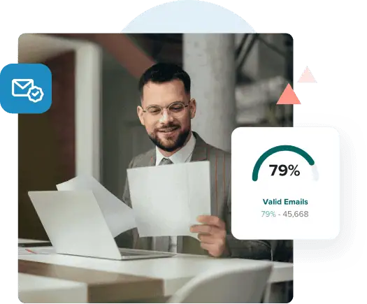 An attorney reviews a document at his desk in front of his laptop next to an image that shows 79% valid emails.