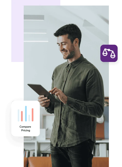 Standing man in green shirt smiles as he touches a tablet with a scale and graph that says “compare pricing.”