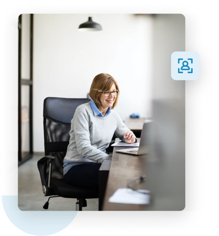 Woman on her laptop works to protect her email deliverability