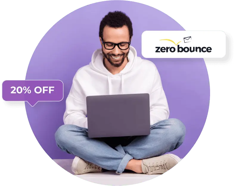 A man in jeans and a white hoodie sits cross-legged in front of a purple background with a laptop next to a pie chart, a 20% off speech bubble, and the ZeroBounce logo.