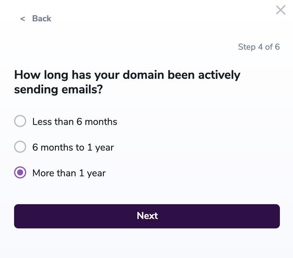 Screenshot of email warmup tool setup asking how long the domain has been actively sending emials.