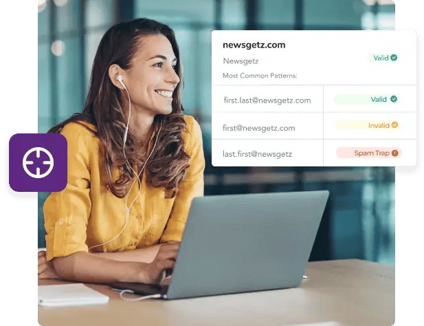 Woman working on laptop wearing headphones looking at her email scrubbing results
