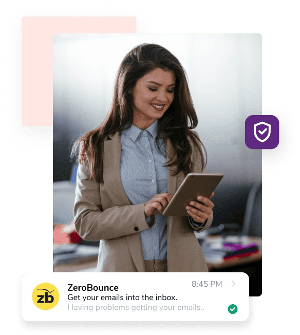 A woman in a blue shirt and brown jacket smiles while holding a tablet next to an email from ZeroBounce with the company logo on the left and the subject line "Get your emails into the inbox."