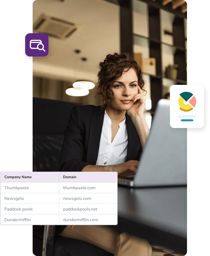 Woman reviewing a list of company names and email domains on her laptop