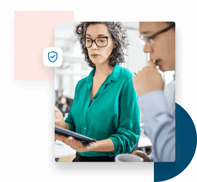 Woman discussing ZeroBounce vs. NeverBounce security highlights with business partner