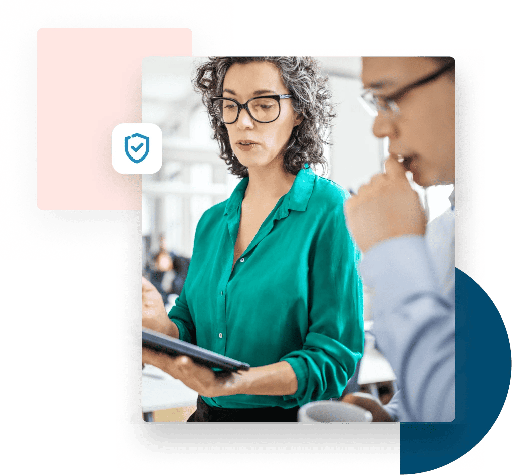 Man and woman looking at a tablet