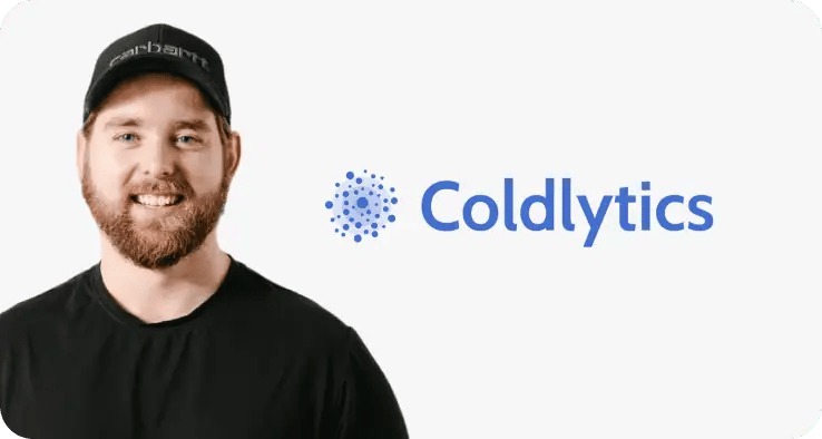 A woman from Coldlytics checks her laptop to see her ZeroBounce case study.