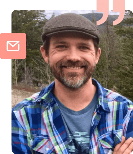 Douglas Patton, Content Expert at Paton Content Marketing stands outside in front of a forest.