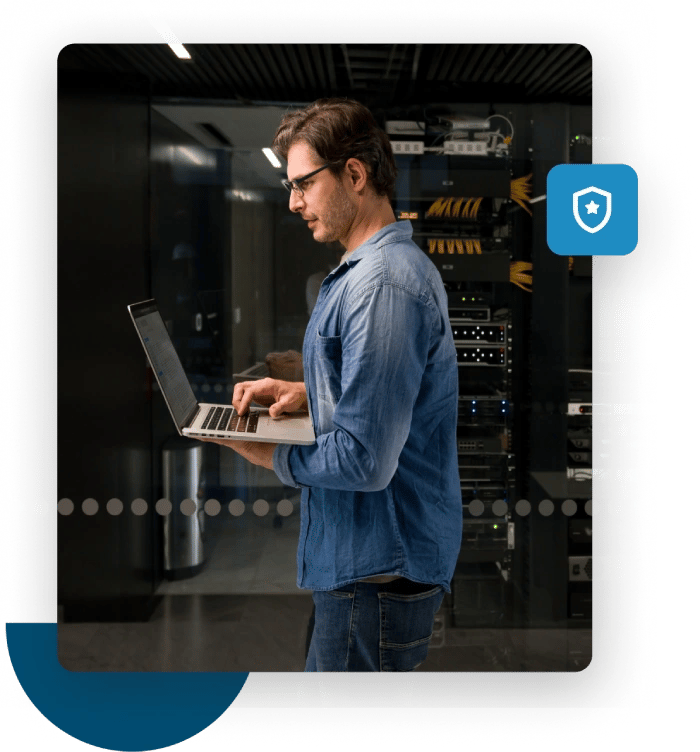 Man on laptop monitors his domain reputation with a free blacklist checker