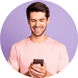 Man smiling with a message icon next to him. ZeroBounce has 99% email validation accuracy.