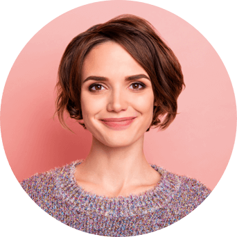 A woman with short brown hair wearing a colorful sweater smiles next to an email icon.
