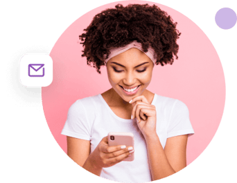 Happy woman using the ZeroBounce iOS app on her phone to get clean emails