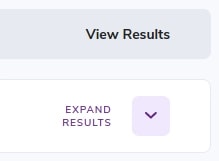 Expand results arrow which allows you to see the details of email deliverability tool tests