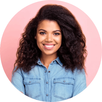 Businesswoman smiling after scaling email outreach with ZeroBounce.