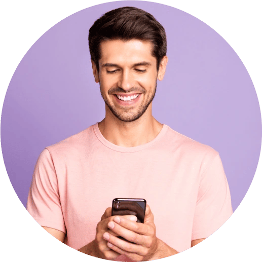 Man smiling with a message icon next to him. ZeroBounce has 99.6% email validation accuracy.
