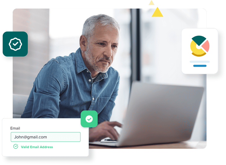 Older man working on laptop uses email verification to clean his list
