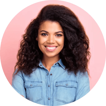 Smiling woman in denim looks at the camera