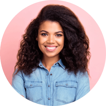 Woman in denim shirt smiling