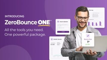 young man wearing glasses looking at laptop on dark purple background with text announcing the launch of ZeroBounce ONE