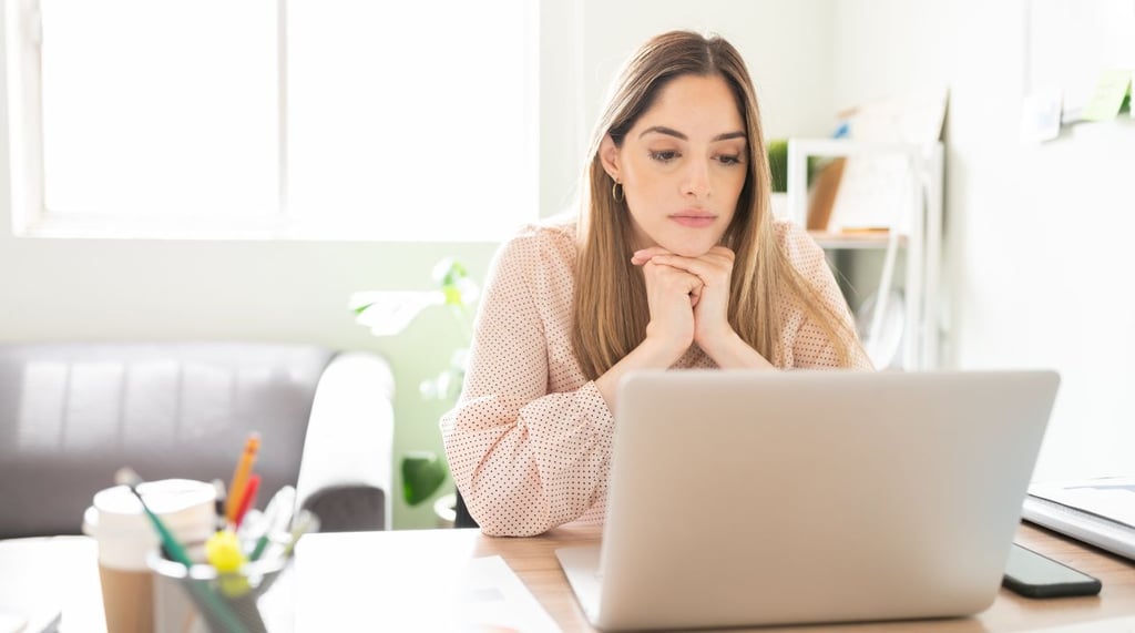 A woman looks at an email finder tool so she can reconnect with a past customer.