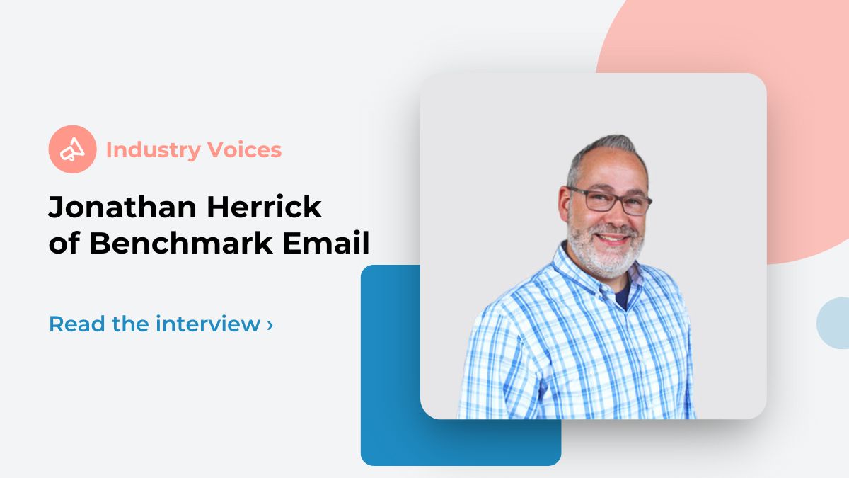 Benchmark Email CEO Jonathan Herrick is shown among pink and blue. shape elements.