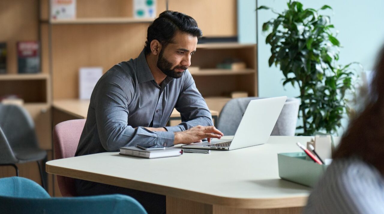 man working at laptop finding ways to aboid gmail bounces ahead of the great gmail purge