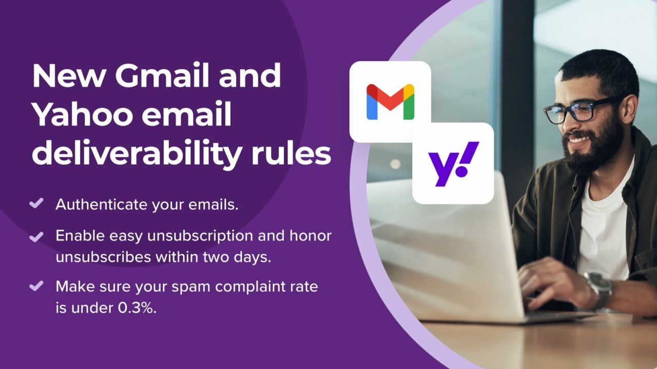Bespectacled man with short hair sits in front of a laptop reading the press release about Gmail and Yahoo's deliverability rules.