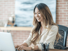 woman exercising proper email list management at her desktop computer