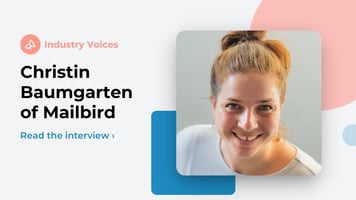 christin baumgarten of mailbird smiling on light gray background