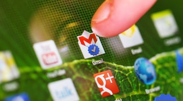 image of different app icons including gmail with finger pointing to gmail blue verified checkmark