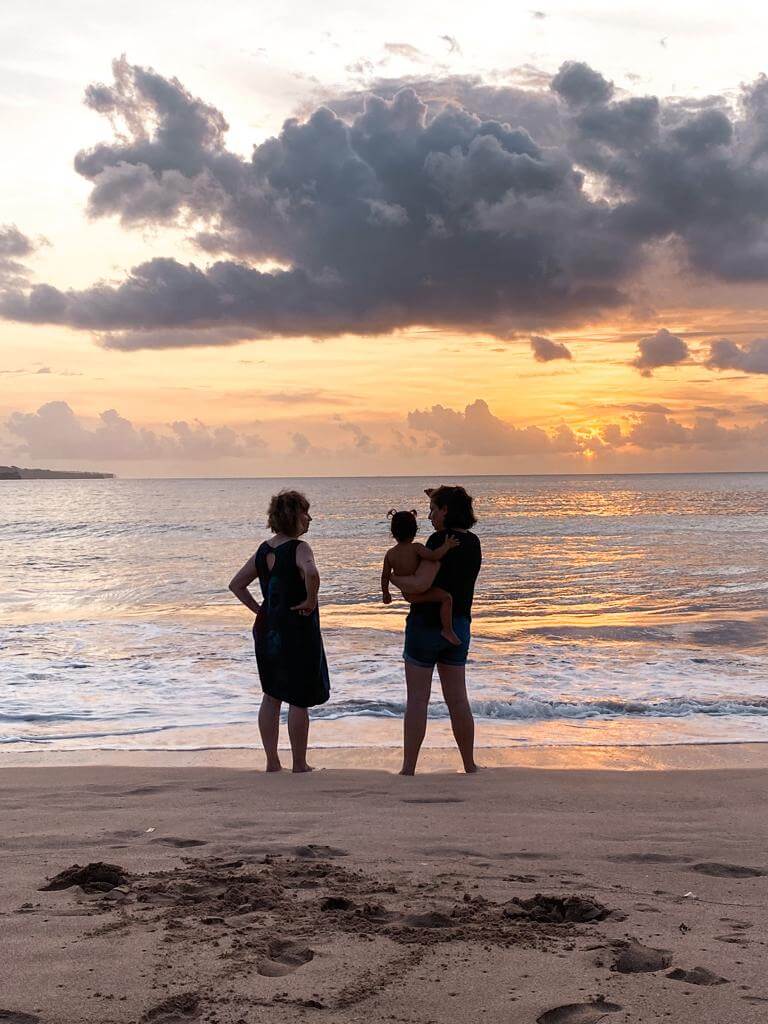 christin baumgarten of mailbird with daughter and monther on the beach by the ocean