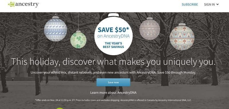 Ancestry DNA call to action for their winter holiday special with a greyed background of a snow filled park with trees and 5 Christmas ornaments handing down from the top stating: This holiday, discover what makes you uniquely you.